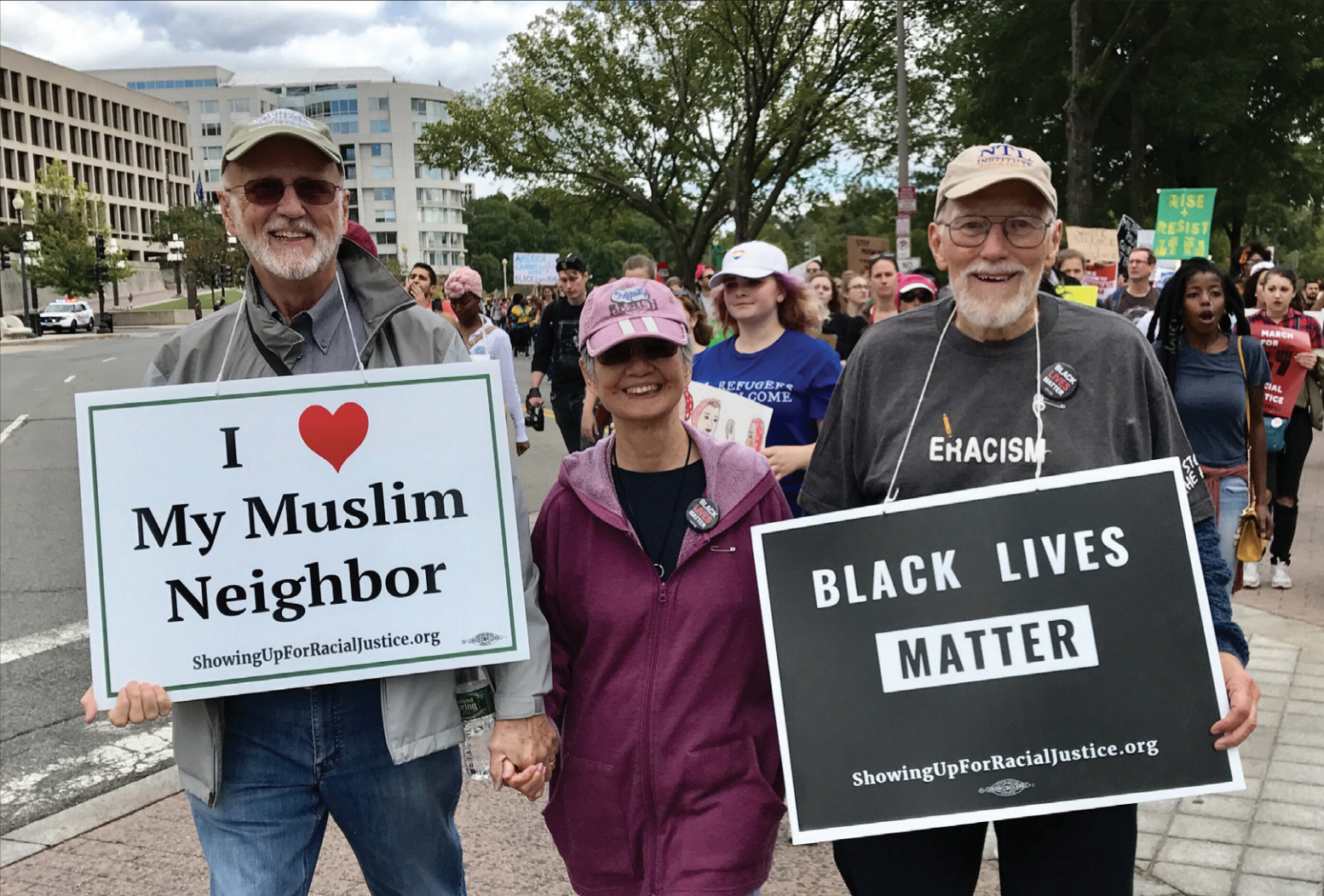 IL_RWV_110119_ackerman_social_justice_1554x1052 The Ackermans march down Pennsylvania Avenue in Washington, D.C., in support of equality for people of color. Dave Ackerman is pictured on the far left, and Toko Ackerman is pictured in the center.