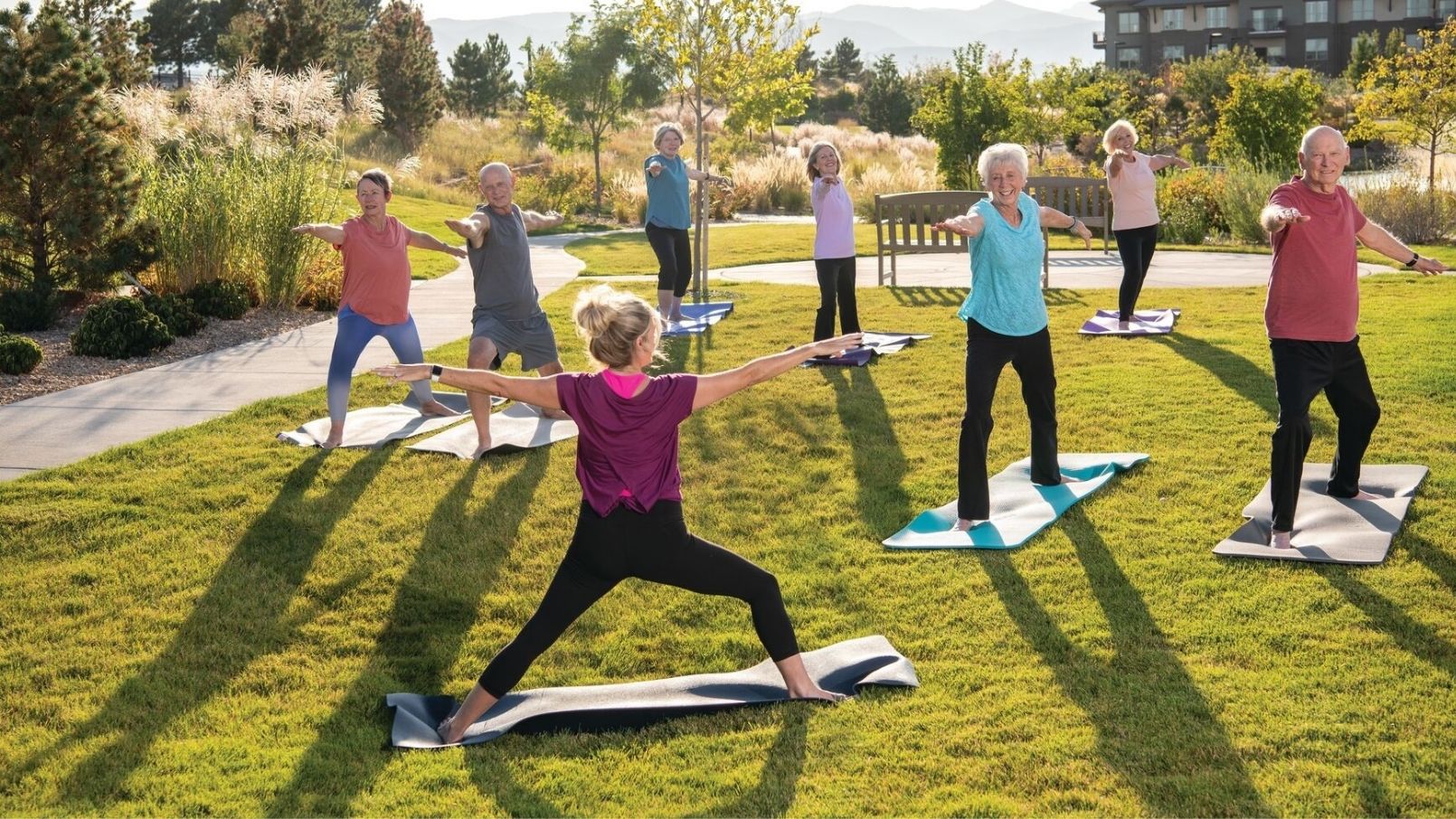 Residents of Erickson Senior Living communities take fitness classes like yoga, even in outdoors.