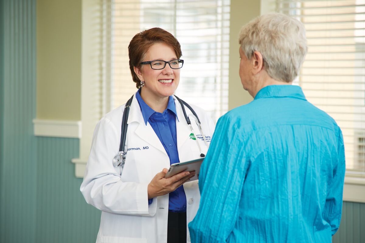 HSD_4-2016_01525_AM.1200x800jpg Senior living doctor consults with a resident