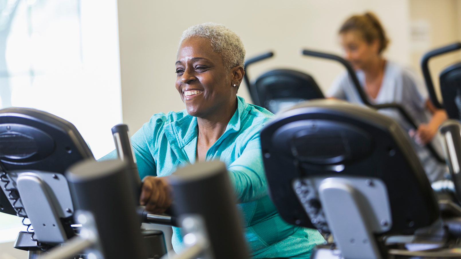 Woman on stationary bike