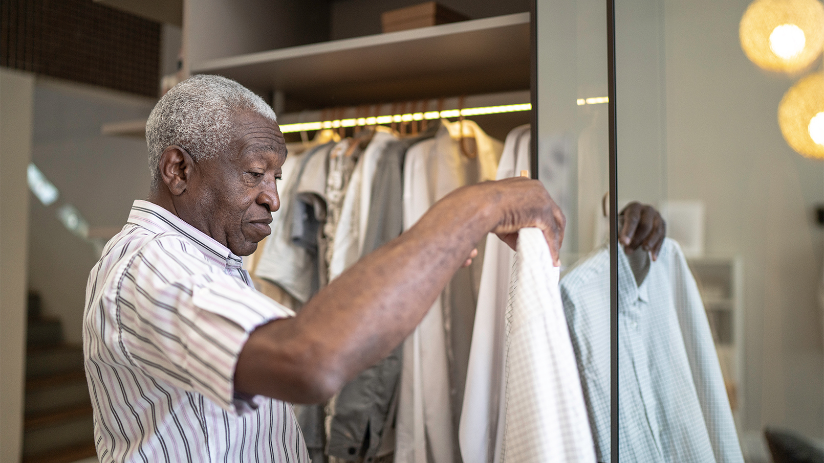 Man sorting clothes