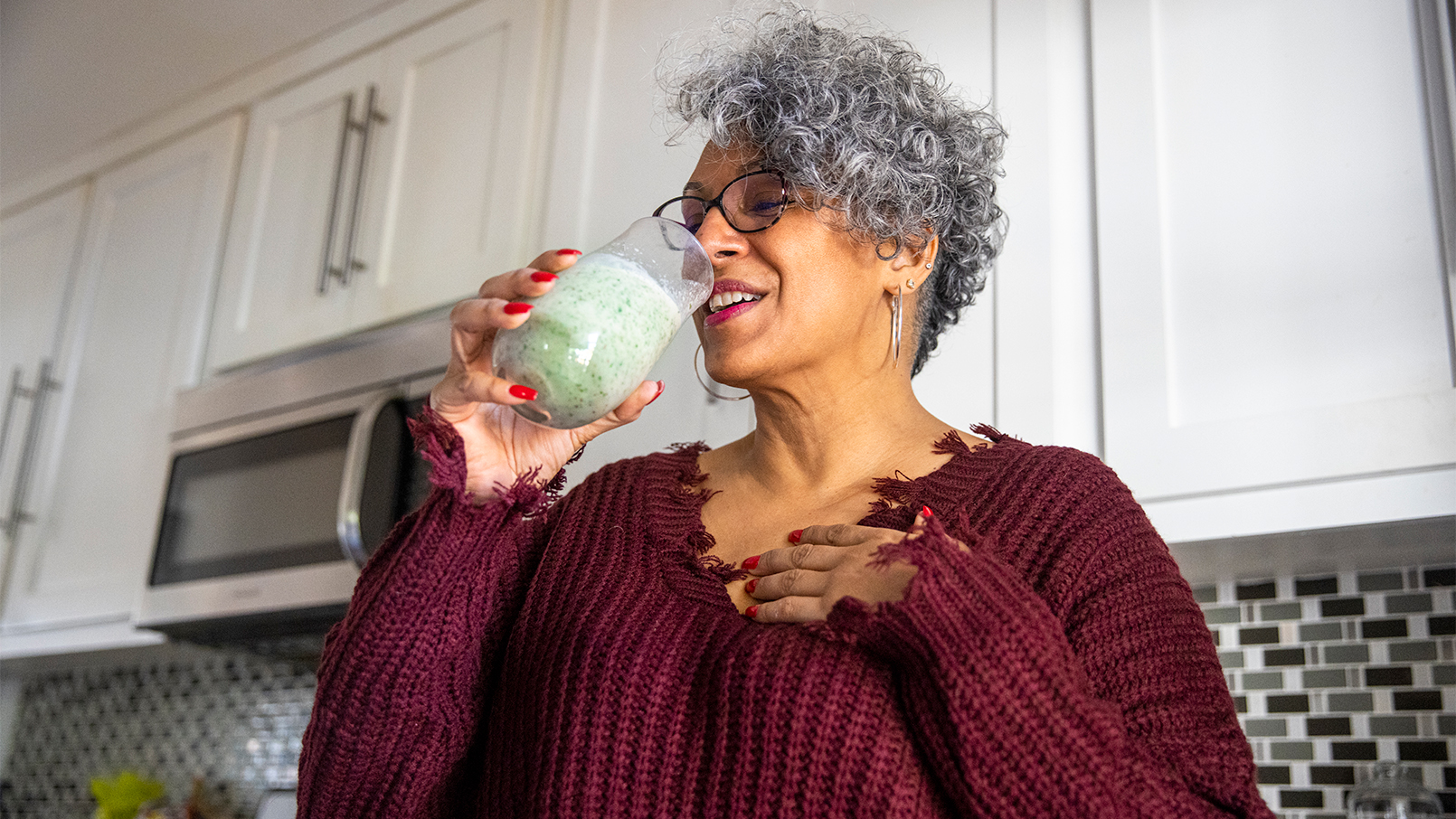 Woman drinking nutritional drink
