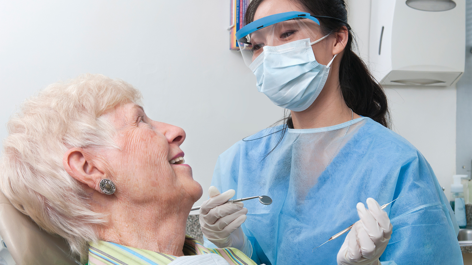 Health_0523_GettyImages-165891121_1610x906_WEB.jpg woman with dental hygienist