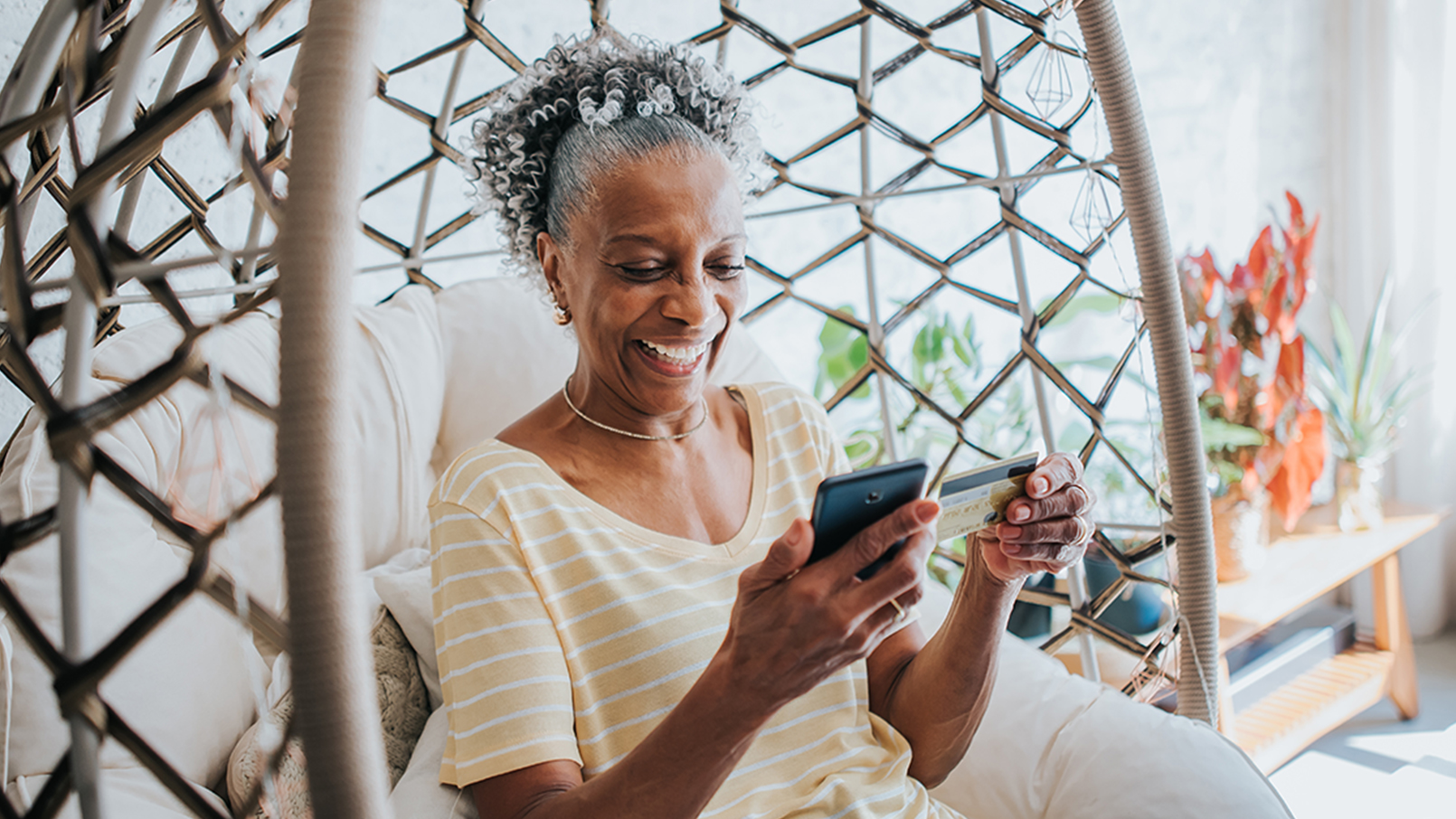 SmartConsumer_0523_GettyImages-1288999250_1610x906_WEB.jpg woman scrolling on smartphone