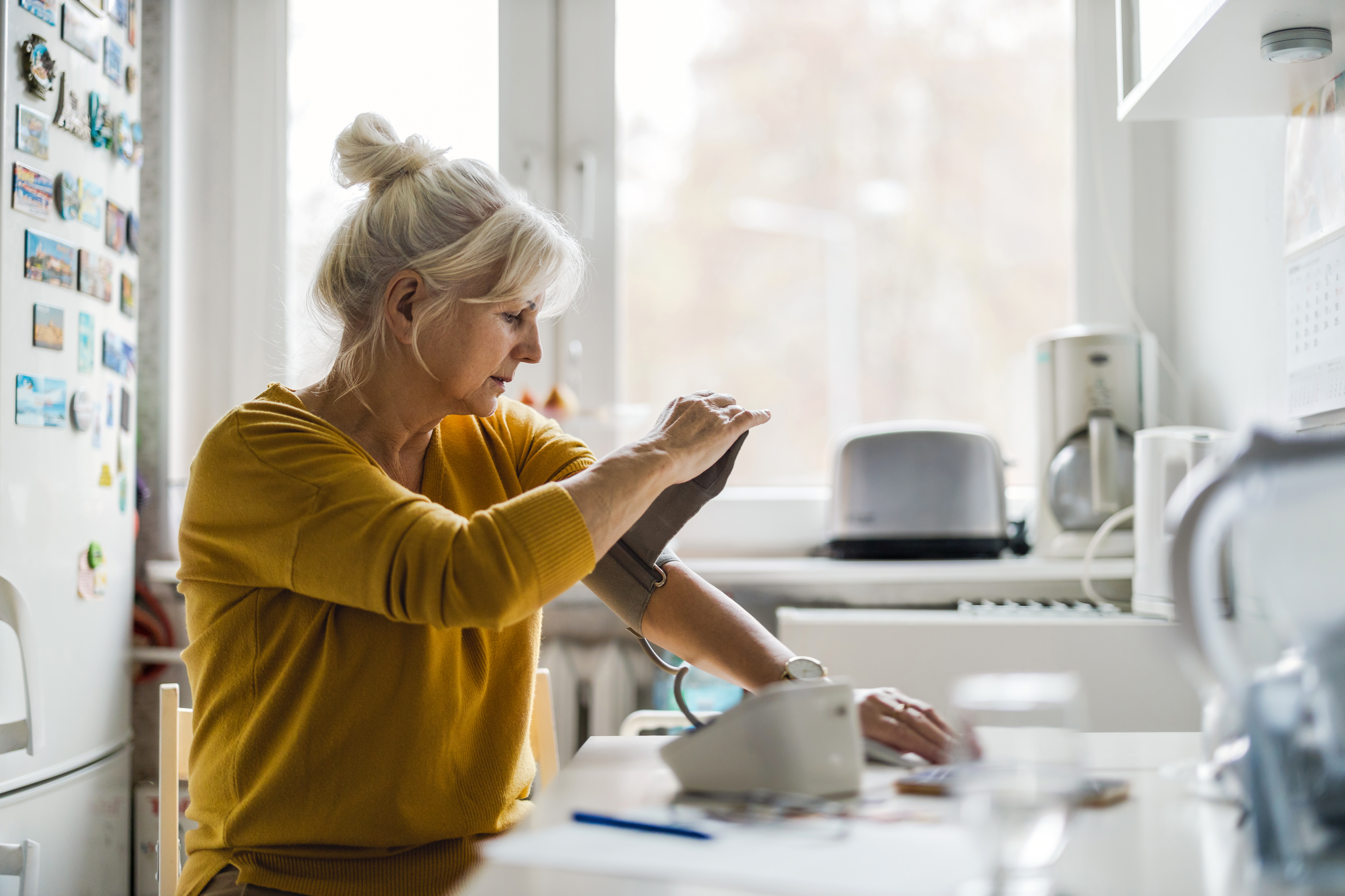 woman checking blood pressure