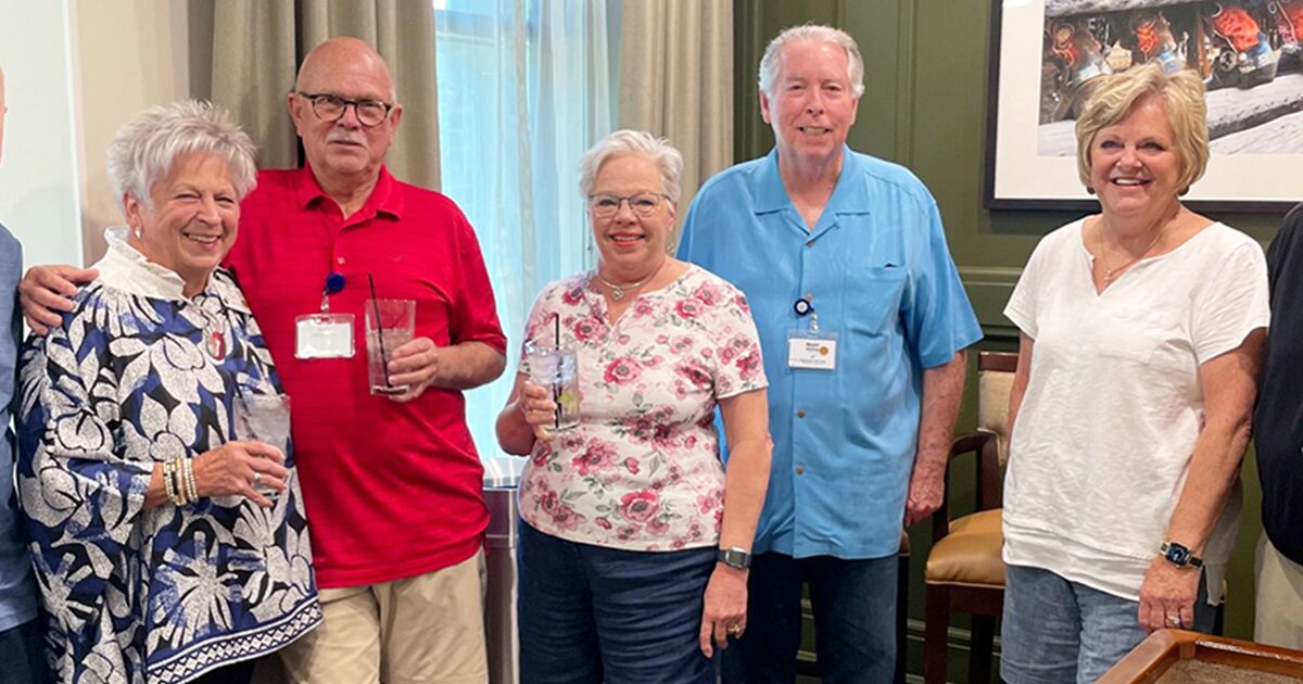 Residents enjoy a game of shuffleboard on the Highland Springs' campus in North Dallas.