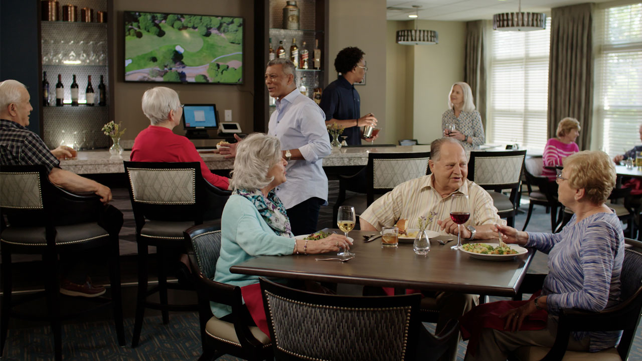 Residents enjoying a Signature Dining experience