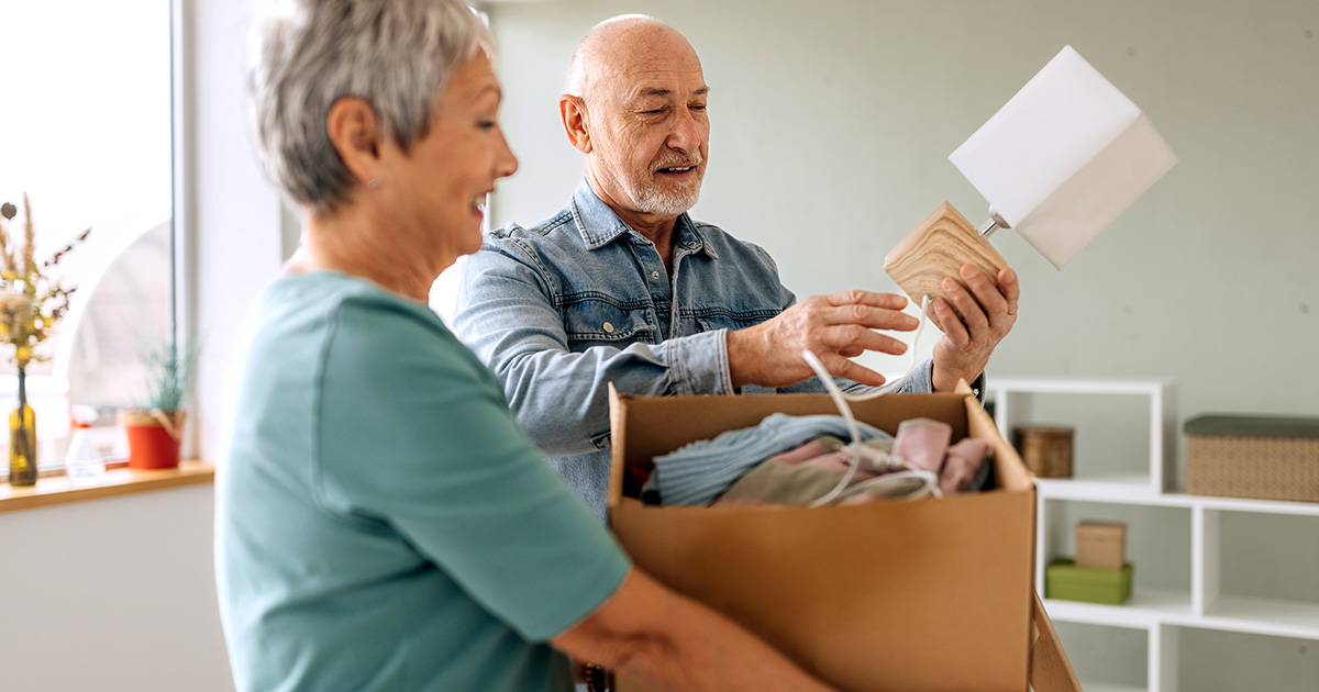 couple adding items to boxes
