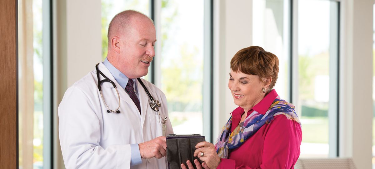 Erickson resident consults with on campus doctor.