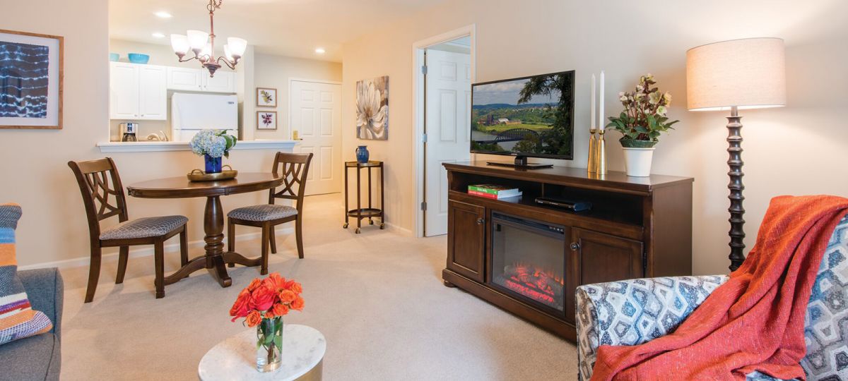 Open floor plan living room with kitchen.