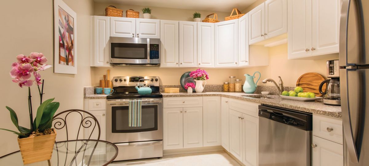 Open and airy u-shaped kitchen.