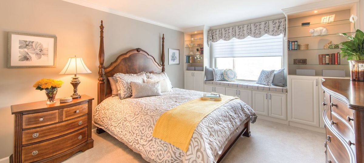 Large bedroom with window bench seat.