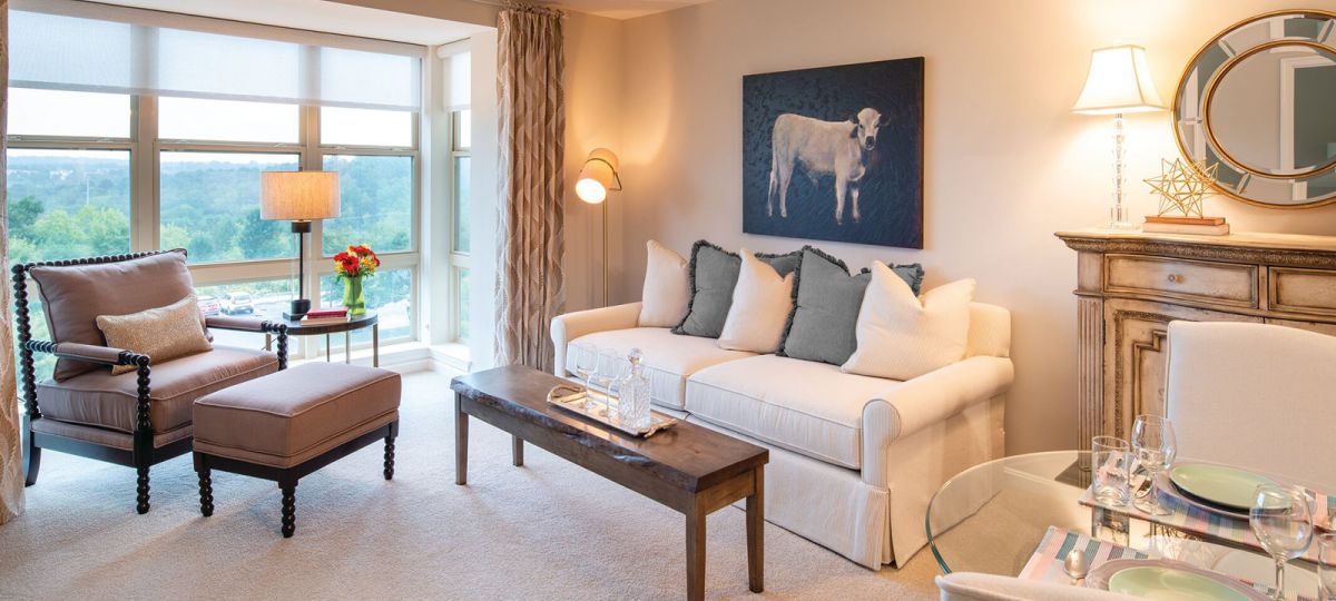 Bright living room with large windows.