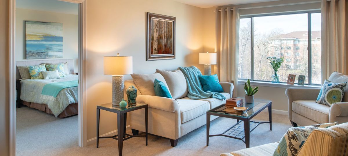 Open living room with large picture windows.