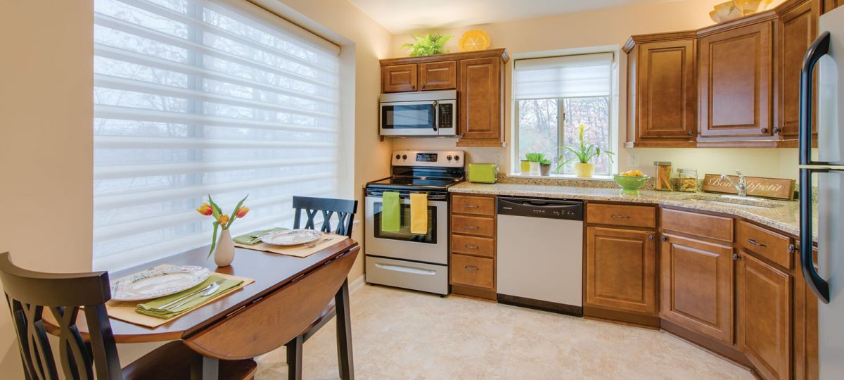 Large kitchen with dining table.