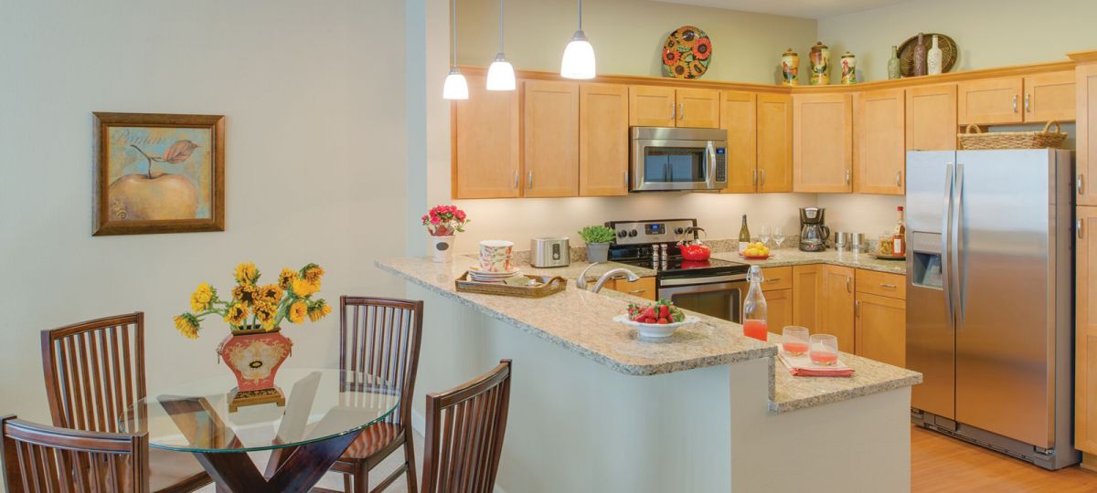 View of kitchen and dining area.