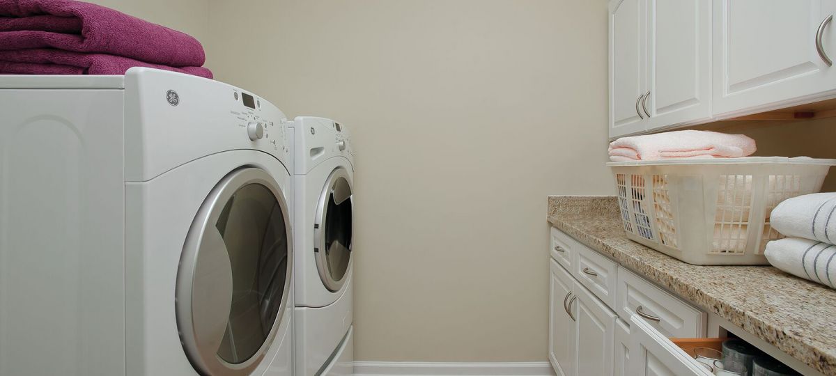 Large, spacious laundry room in an Erickson Living apartment.
