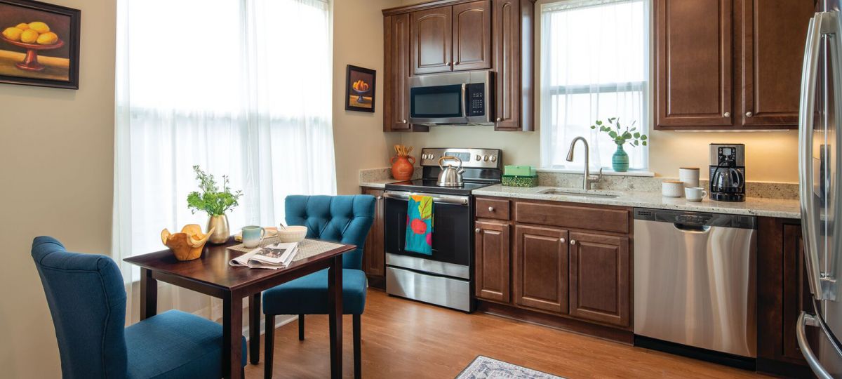 Bright, open kitchen with breakfast table.