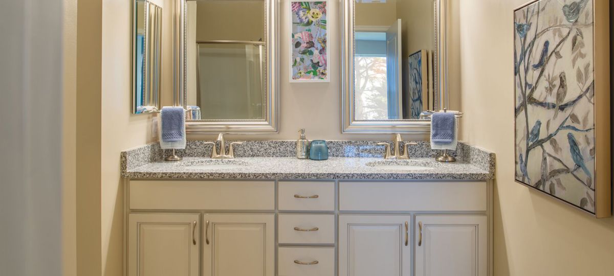 Bathroom vanity in Wilson apartment home.