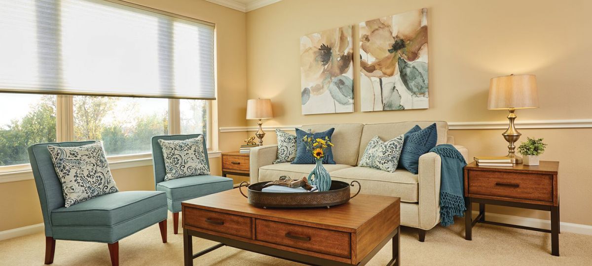 Open living room with large windows.