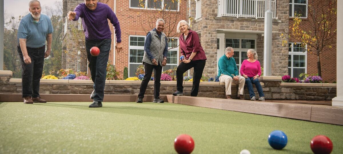 Medium-LHN_10-2019_2158-0208 Image of Erickson residents playing Bocce on the community lawn.