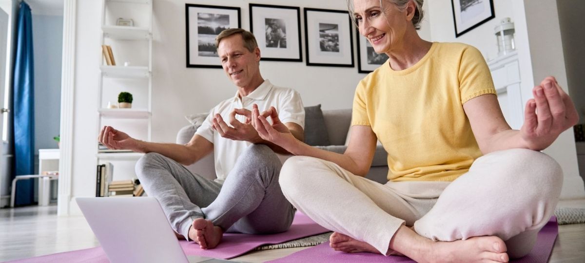 Couple doing yoga Couple doing yoga