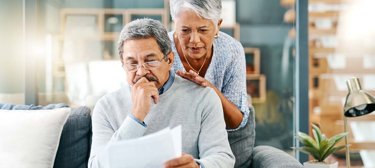 GettyImages-1139792625_1610x906 a couple looking at paperwork