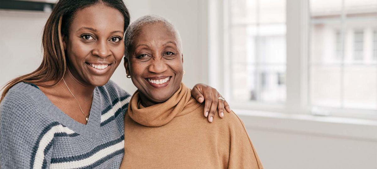 GettyImages-1297274356_1610x906 mother with adult child, smiling