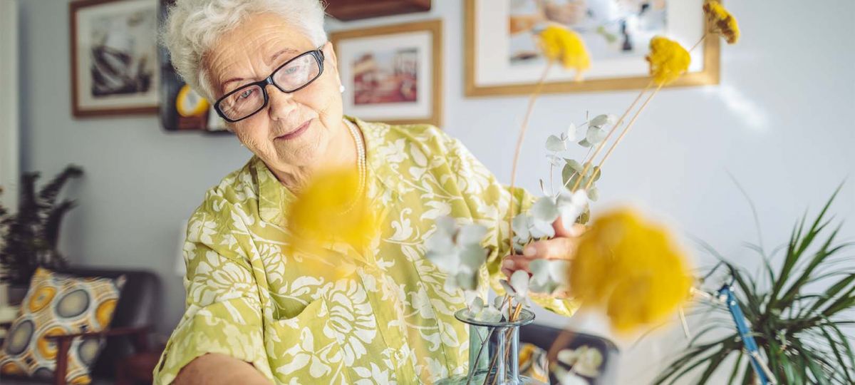 GettyImages-1145458440_1610x906 woman tending to plants