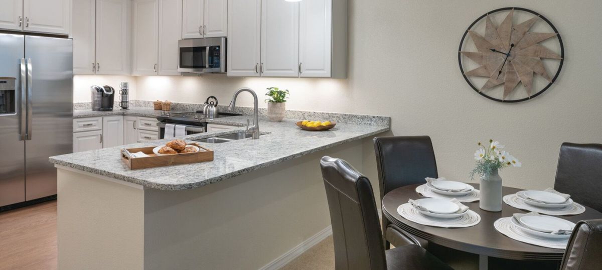 Interior shot of a bright kitchen in an Erickson one-bedroom apartment.