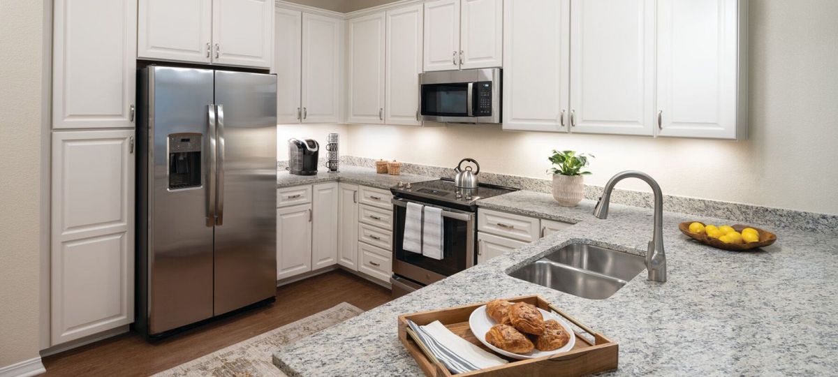 Interior shot of a bright kitchen in an Erickson one-bedroom apartment.