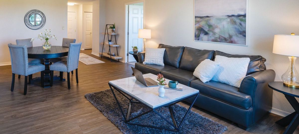 Interior shot of a nicely decorated living room in an Erickson two-bedroom apartment.