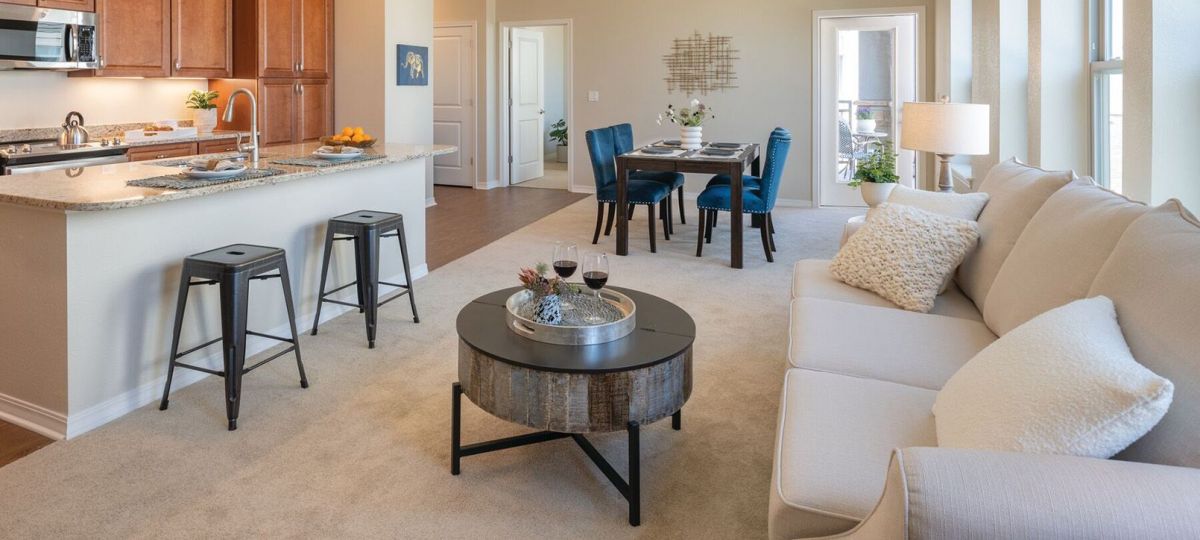 Wide shot of the living room and breakfast bar.
