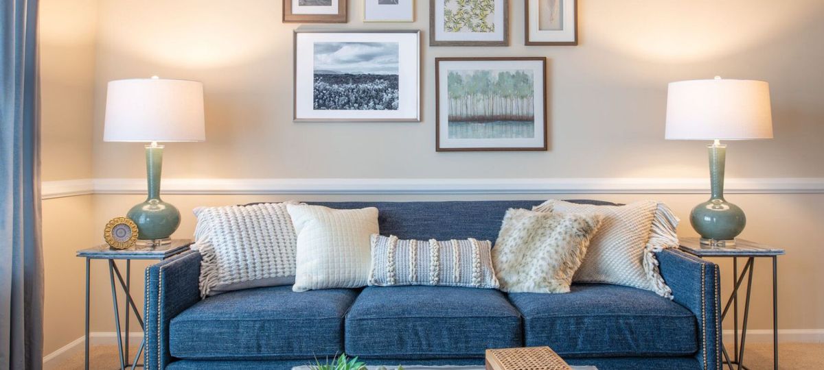 Interior shot of a nicely decorated, open living room in an Erickson two-bedroom apartment home.