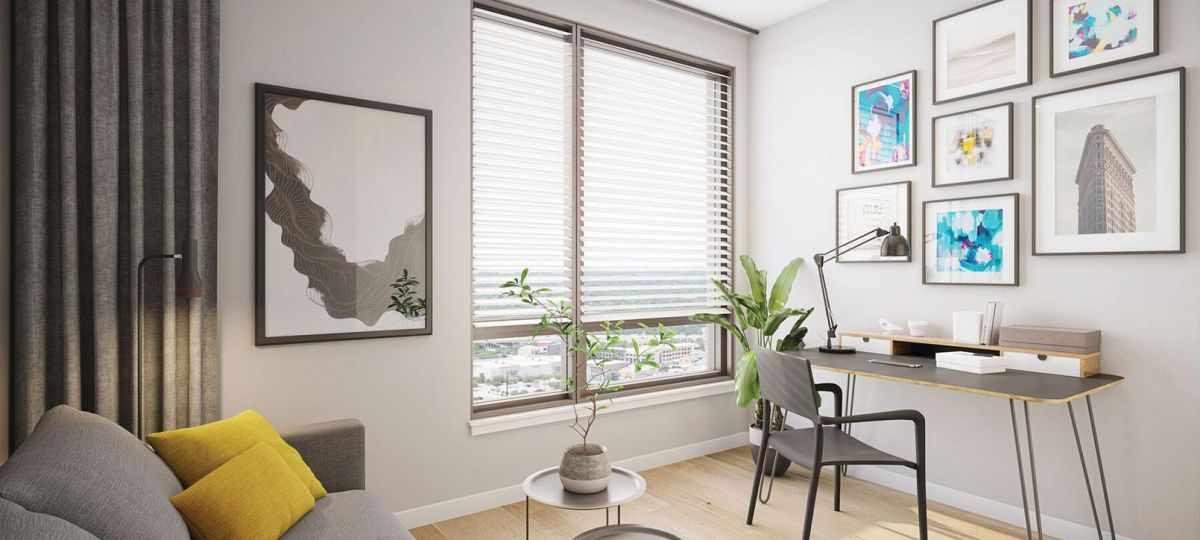 Cozy, light-filled den office in an Erickson one-bedroom apartment.