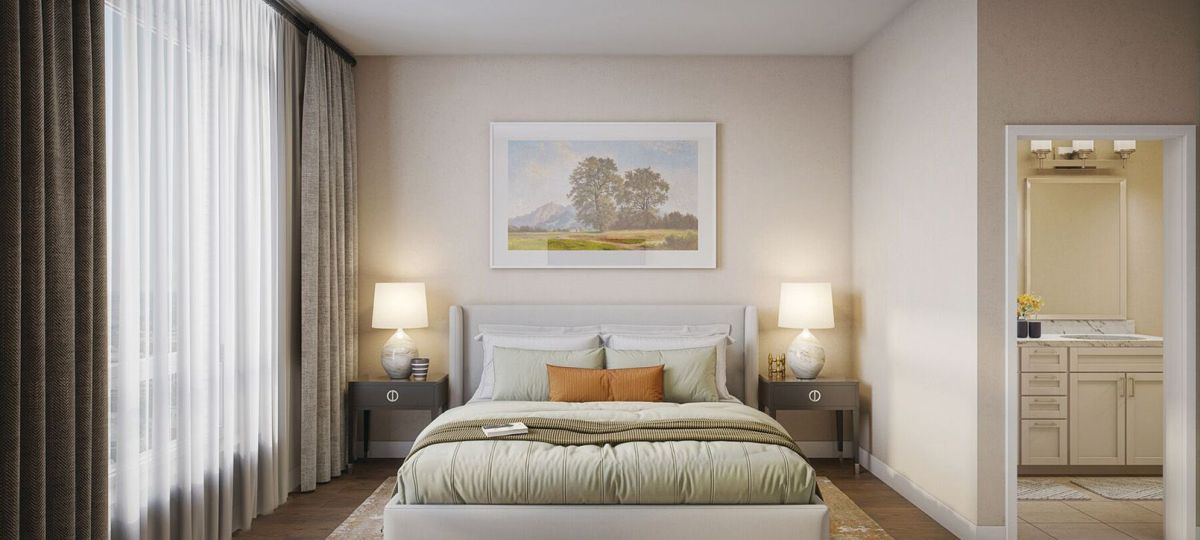 Large light-filled main bedroom in an Erickson deluxe two-bedroom apartment.