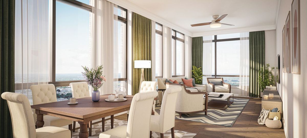 Spacious and inviting apartment living room with cozy seating, tasteful decor, and abundant natural light.