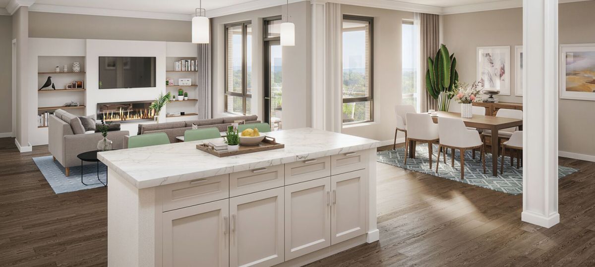 Spacious and inviting apartment living room with cozy seating, tasteful decor, and abundant natural light.