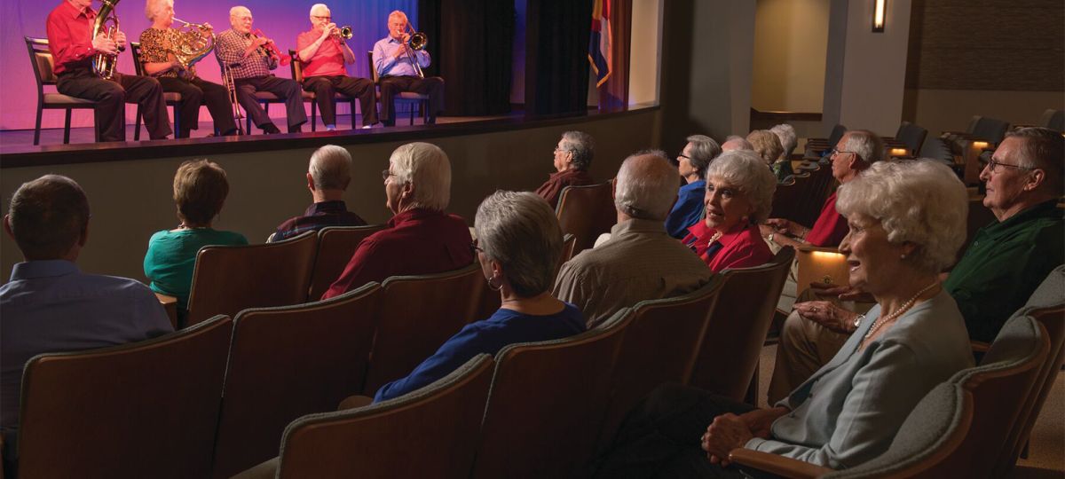 people watching performance in theater