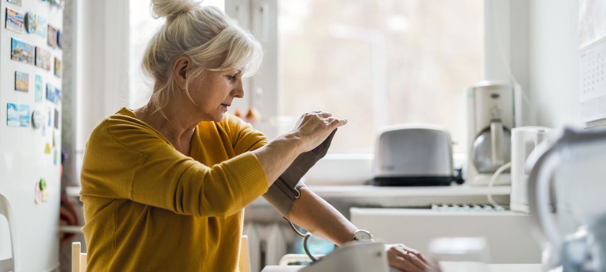 woman checking blood pressure