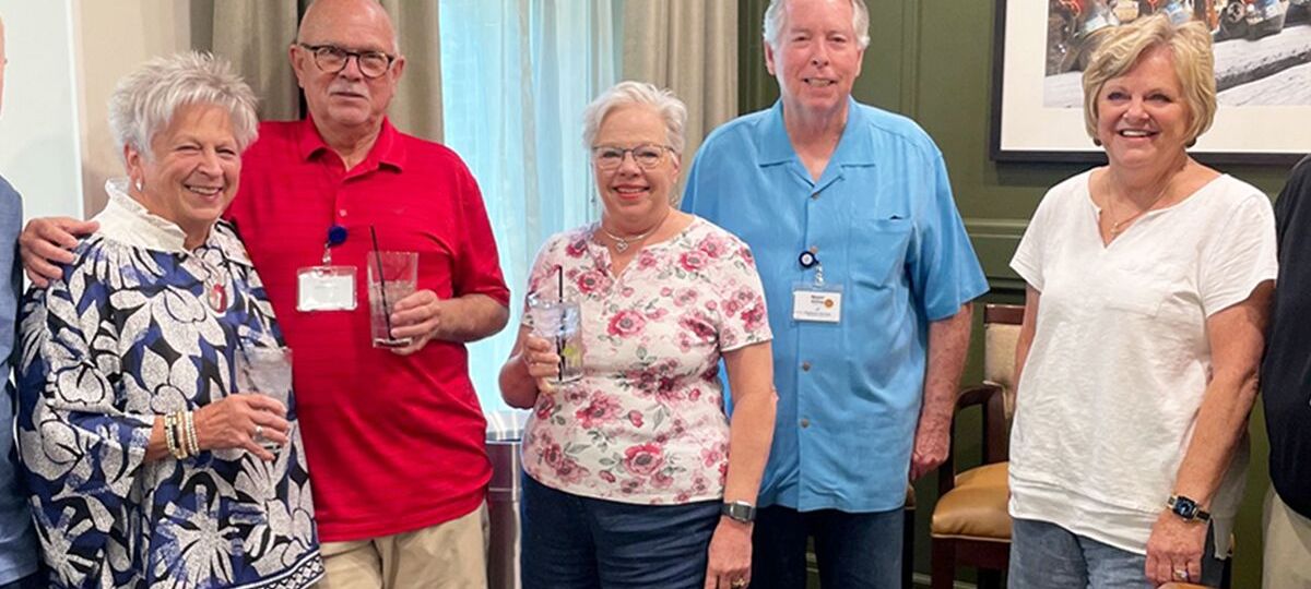 Residents enjoy a game of shuffleboard on the Highland Springs' campus in North Dallas.