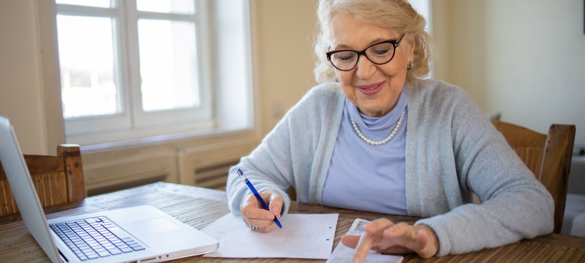 senior woman going through a budget
