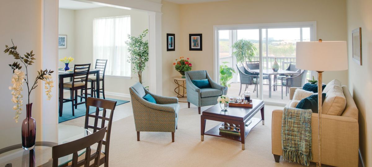 Comfortable and well-furnished living room in an Erickson Senior Living community apartment.