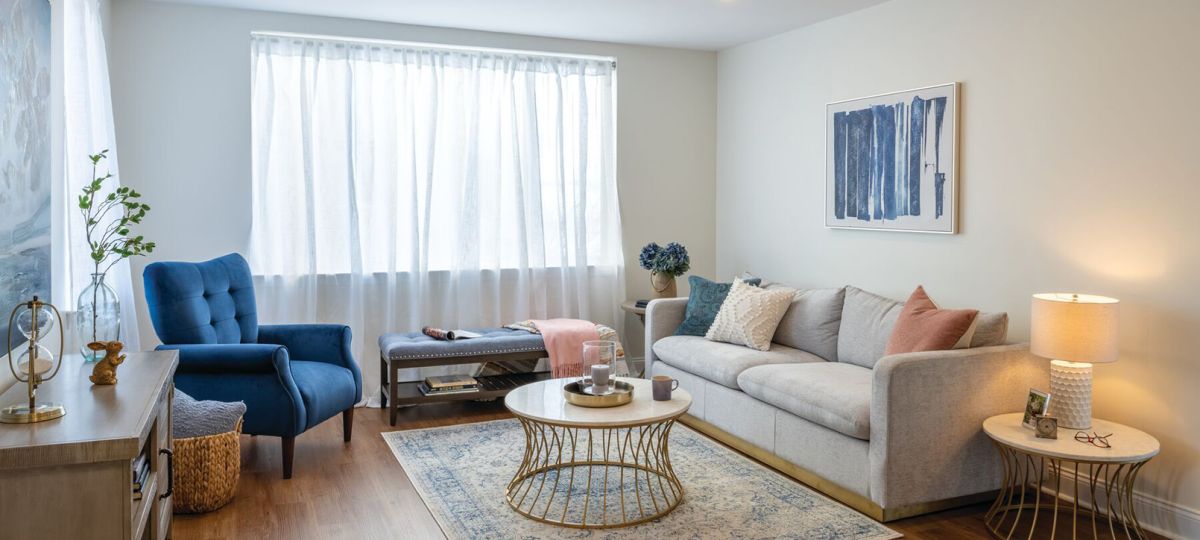 Comfortable and well-furnished living room in an Erickson Senior Living community apartment.