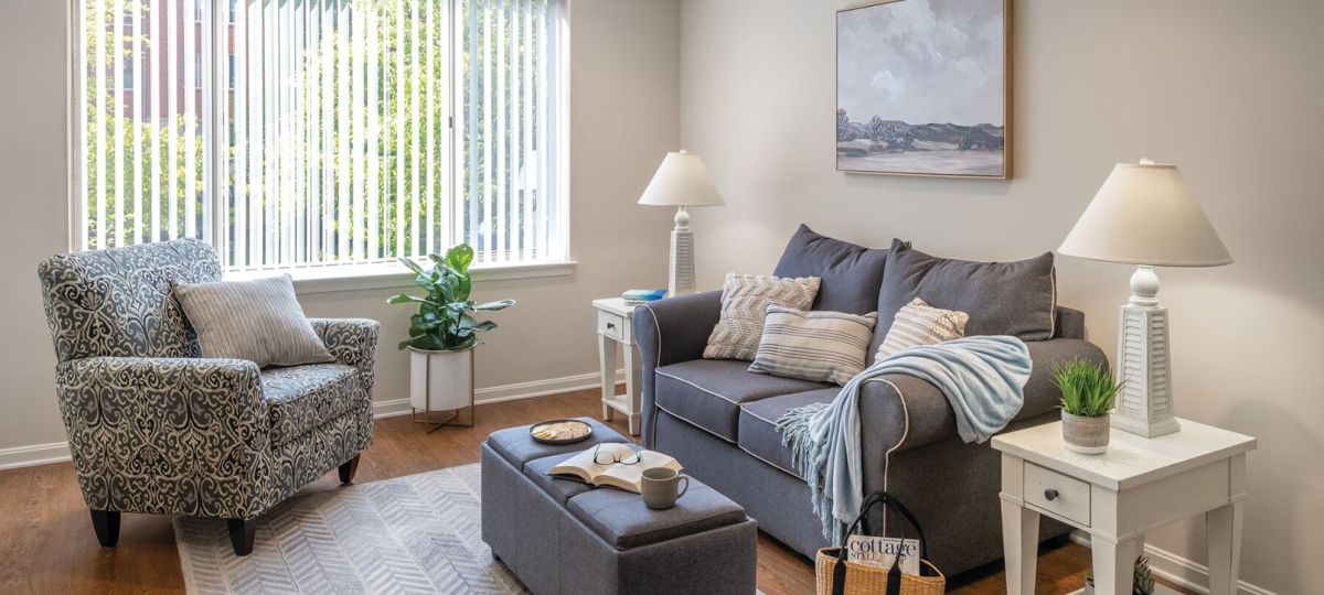 Comfortable and well-furnished living room in an Erickson Senior Living community apartment.