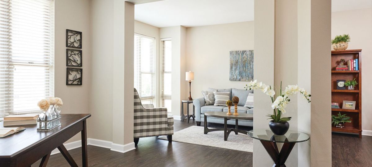 Comfortable and well-furnished living room in an Erickson Senior Living community apartment.