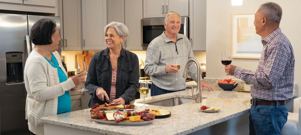 four residents enjoying refreshments