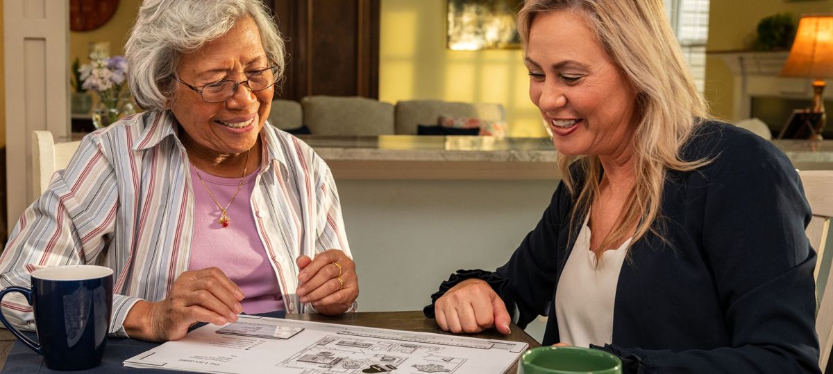 a prospective resident meeting with a planning and moving expert