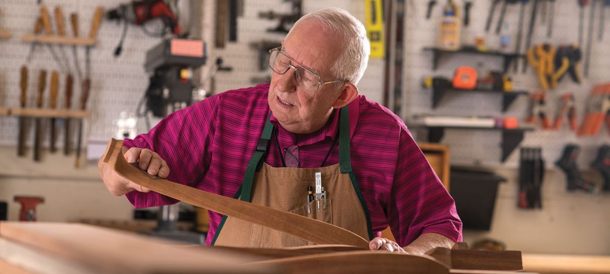 Resident in a wood shop working on a project