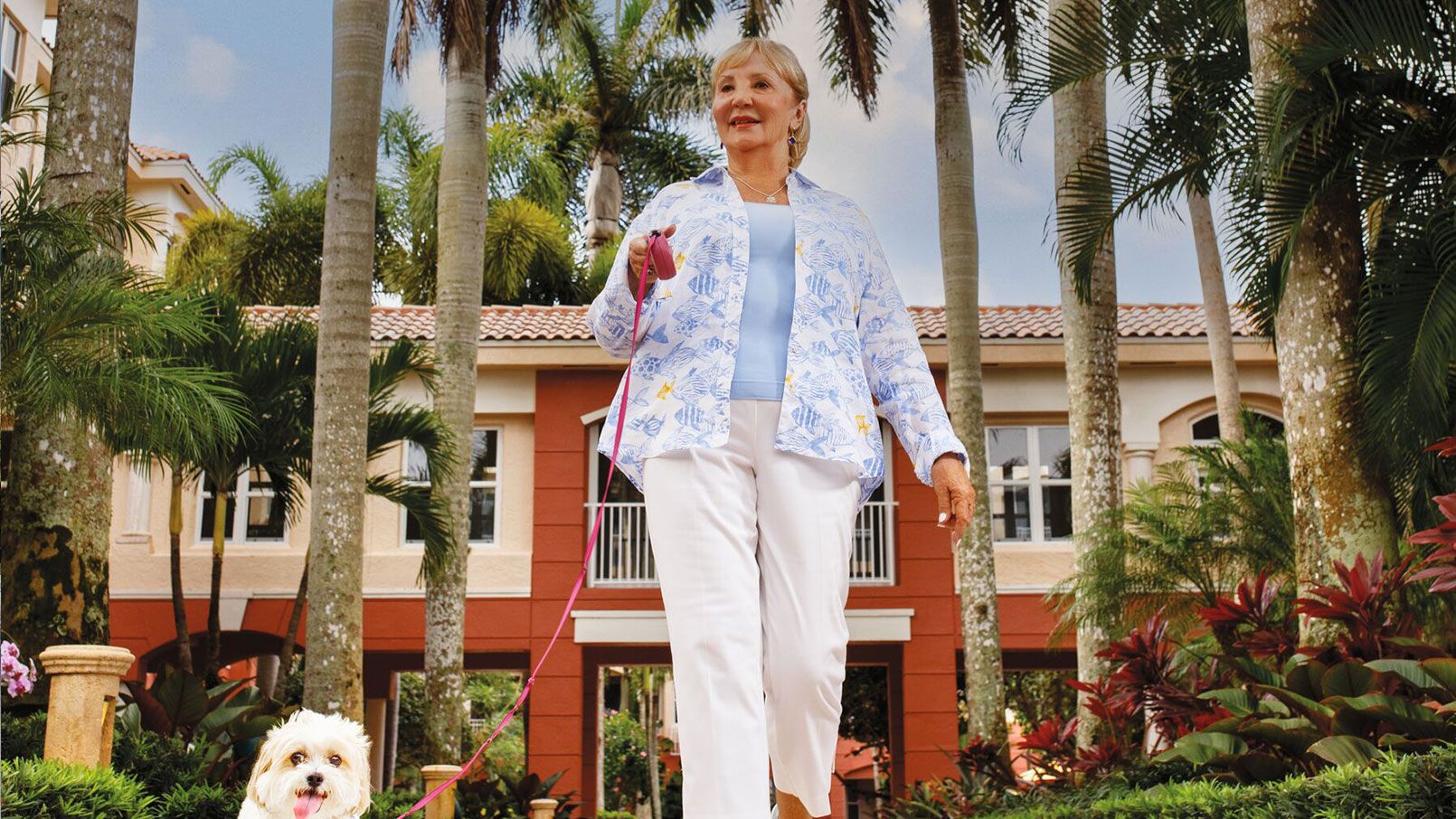 Resident walking her dog